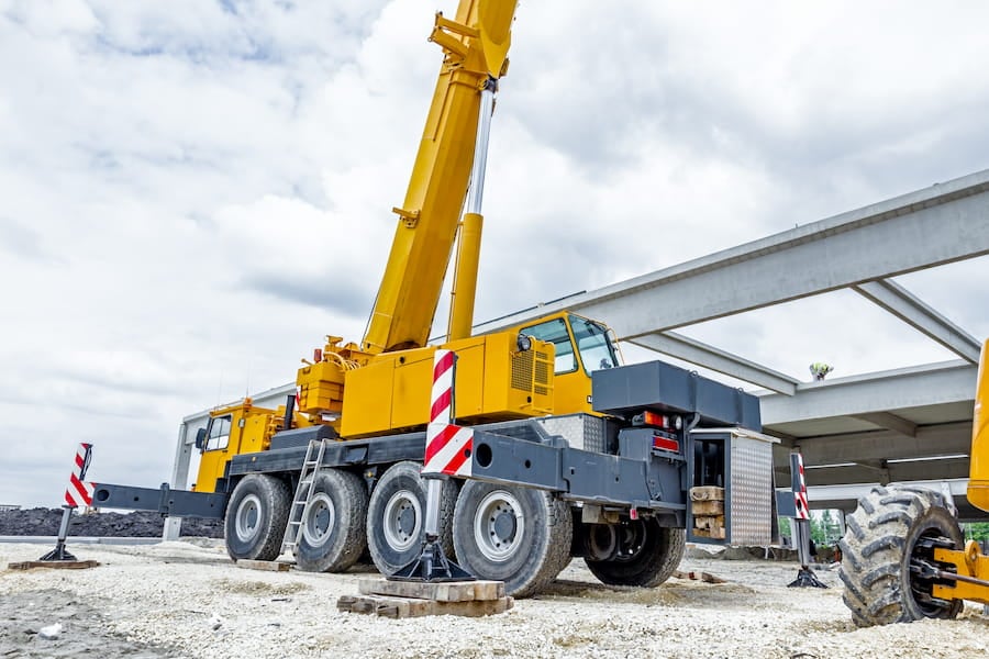 Yellow crane at a construction site